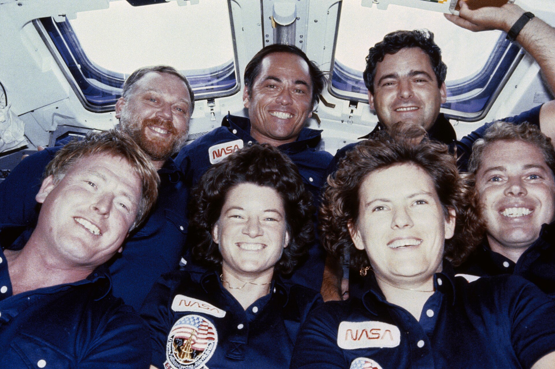 The crew of Space Shuttle flight 41-G on the flight deck in 1984